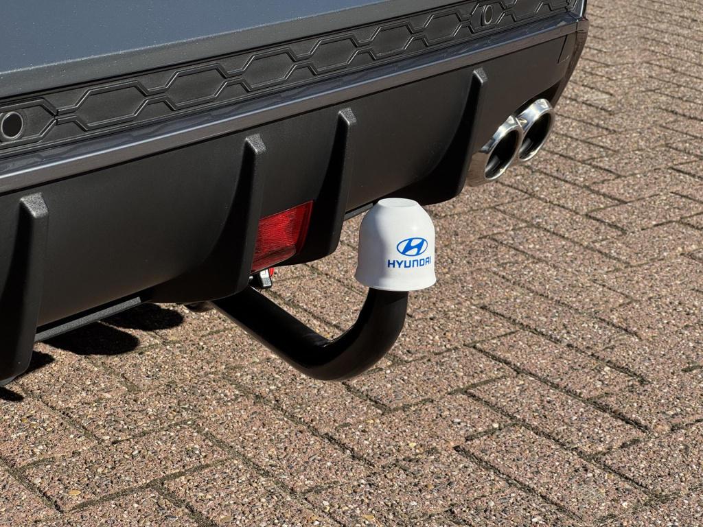 Hyundai Kona 1.6 gdi hev n line trekhaak afneembaar, allseasons + nieuwstaa
