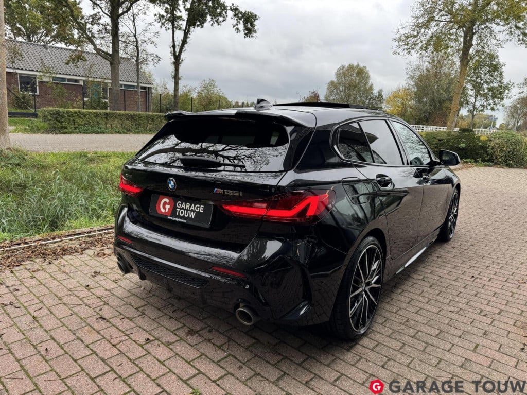 BMW 1 Serie m135i xdrive high executive edition pano orig.nl