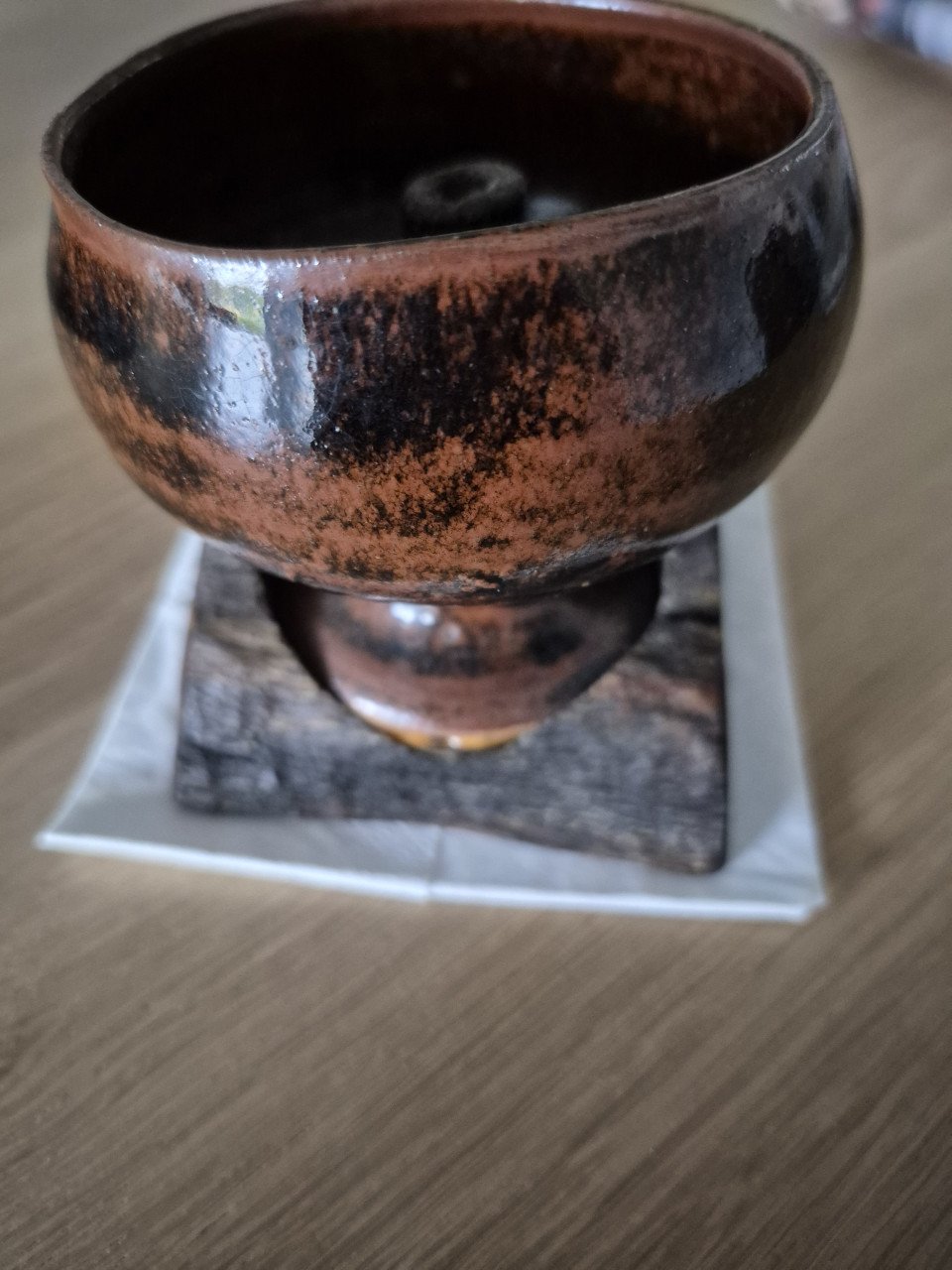Olielampje op voet wrakhout van de Wasa.