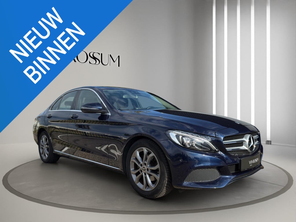 Mercedes-Benz C-Klasse c 180 business solution auto | navigatie | half lede