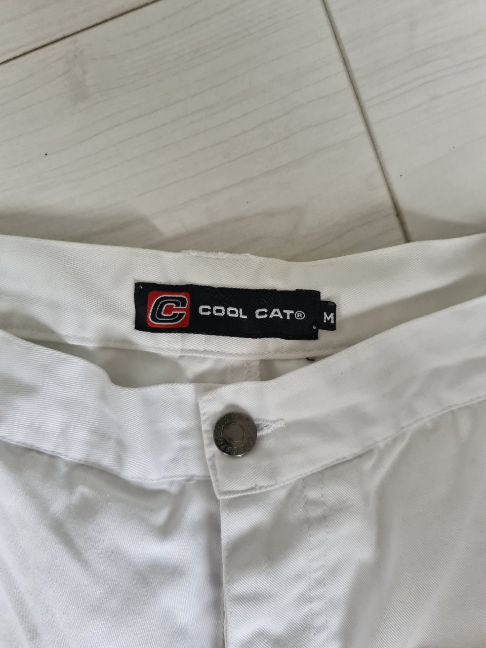 Witte 7/8 spijkerbroek van Coolcat Sluit dmv knopen  Maat M