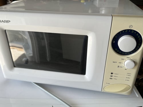 Vrijstaande magnetron Zo goed als nieuw Eenvoudig te bedienen