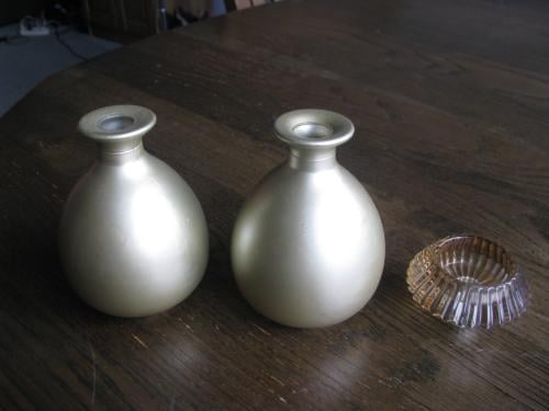 Kaarsenhouders.