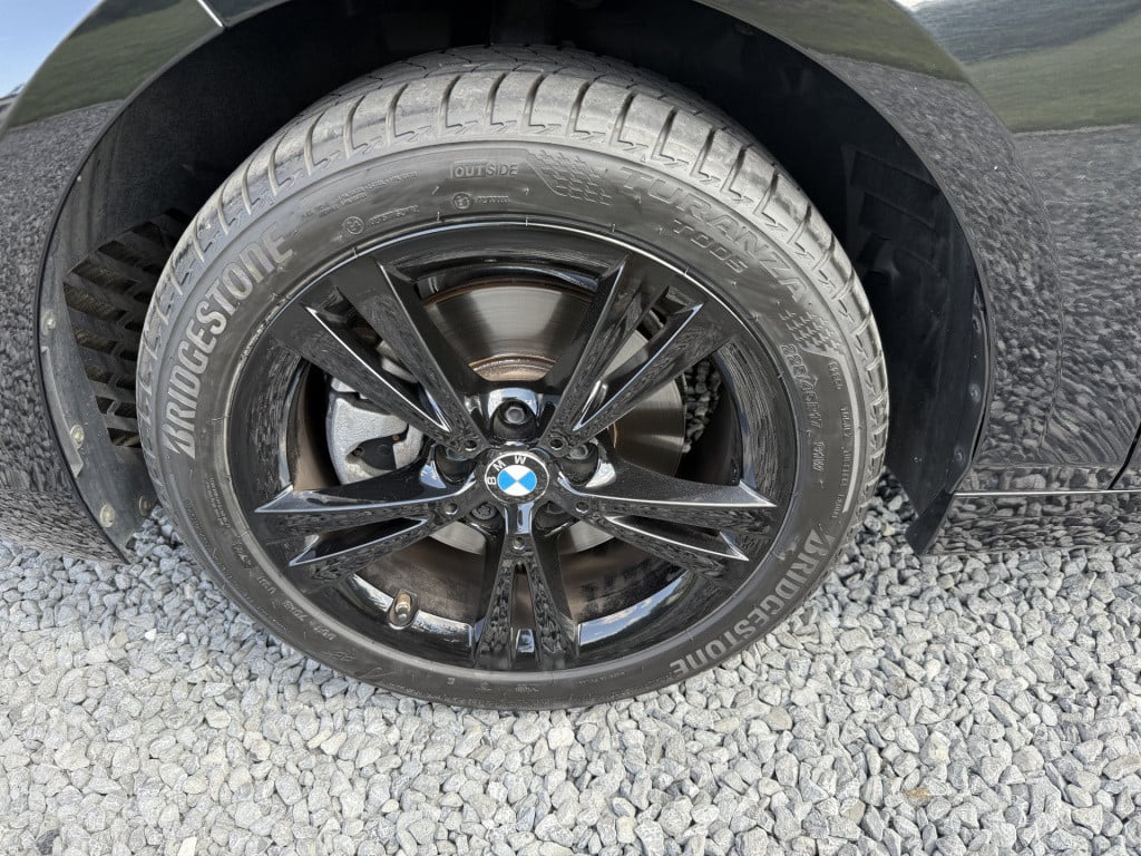 BMW 1 Serie 118i 140pk automaat high executive sportline 5-drs