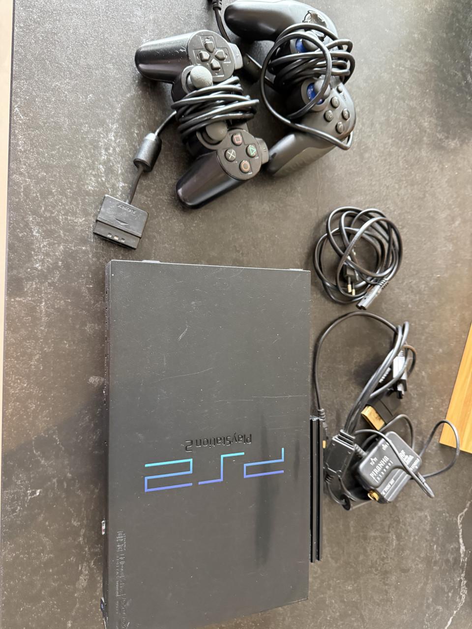 Playstation 2 met 11 games, 2 controllers en kabels