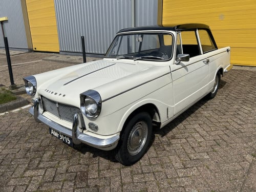 Triumph Herald 1965 en TR6 1973