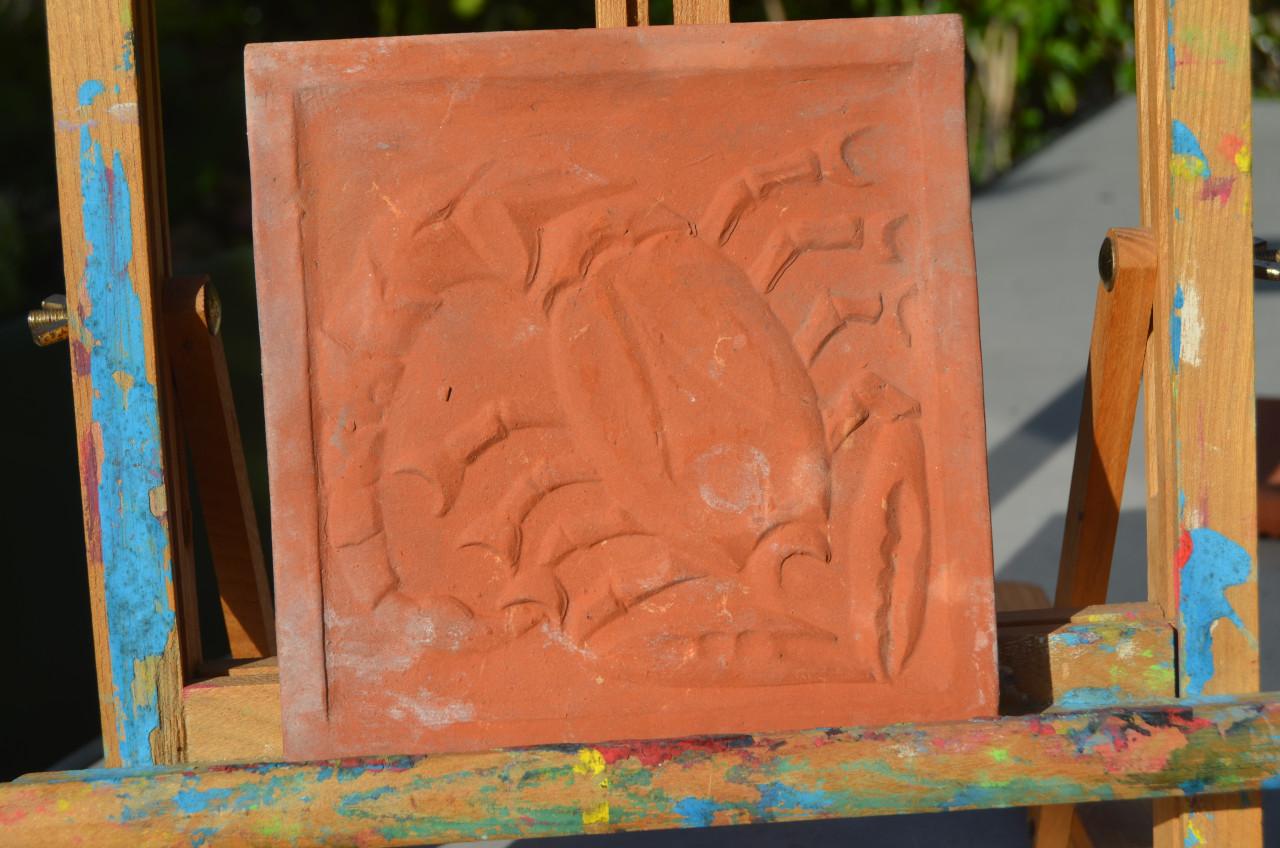 Verschillende terracotta tegels Sterrenbeelden/ Zodiac