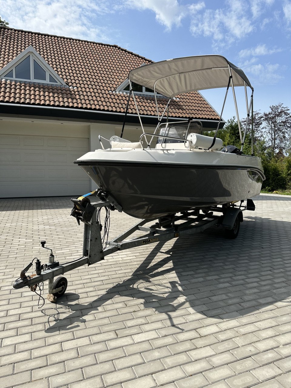 Mooie Elan 15SC met vrijwel nieuwe Mercury 60 pk en Pega trailer