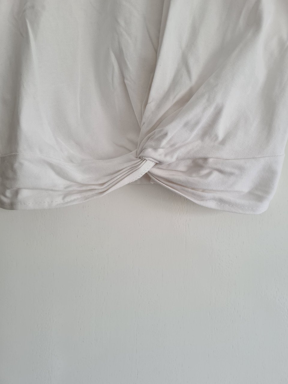 Wit shirt met knoop detail Mt 128-134