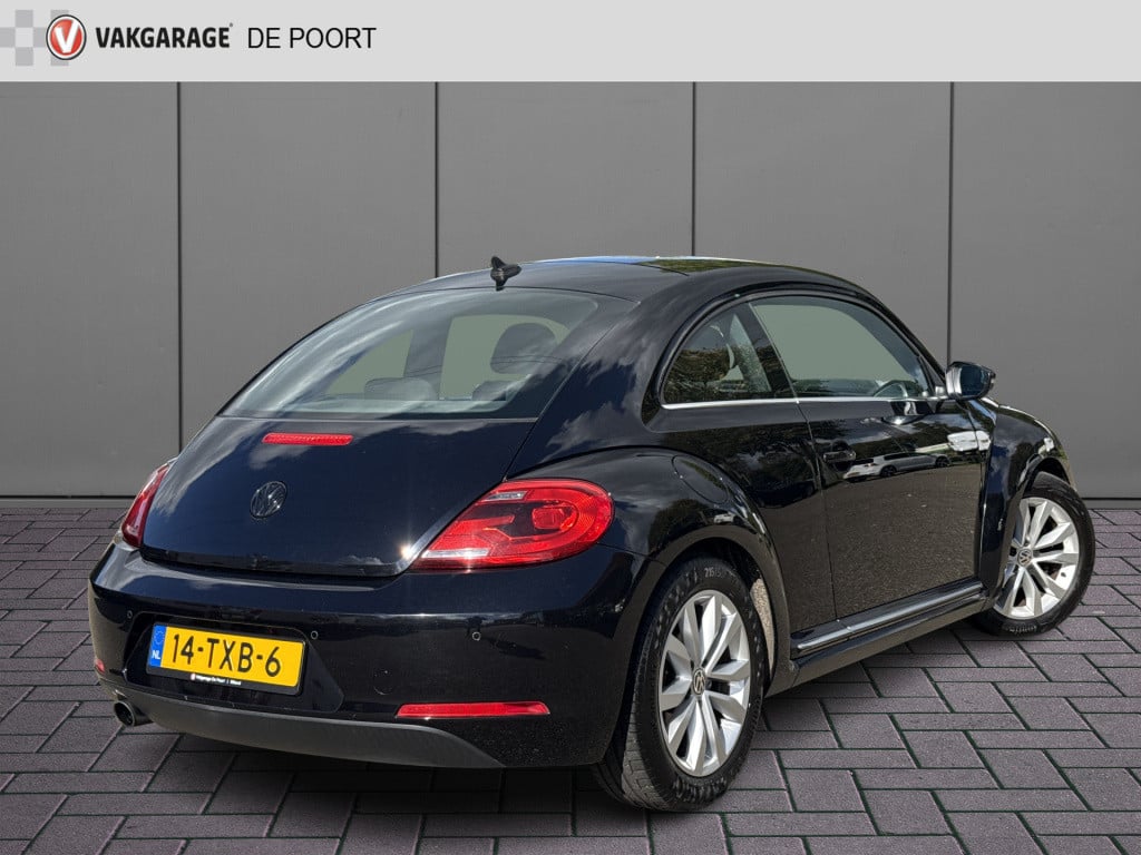 Volkswagen New Beetle 1.2 tsi design | nl-auto | navi | airco | cruisec.