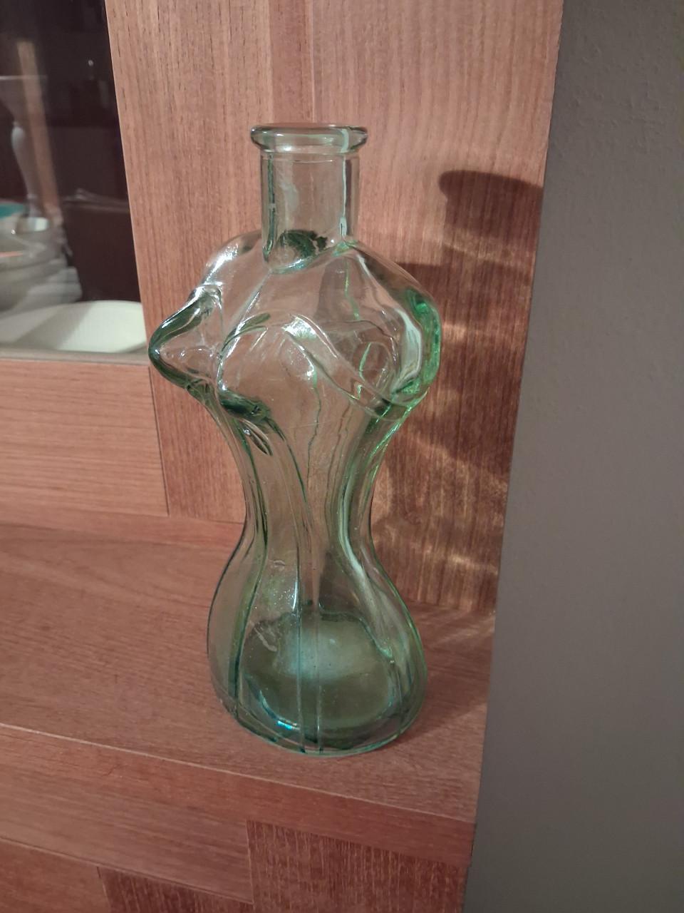 Vaas of fles in de vorm van een buste