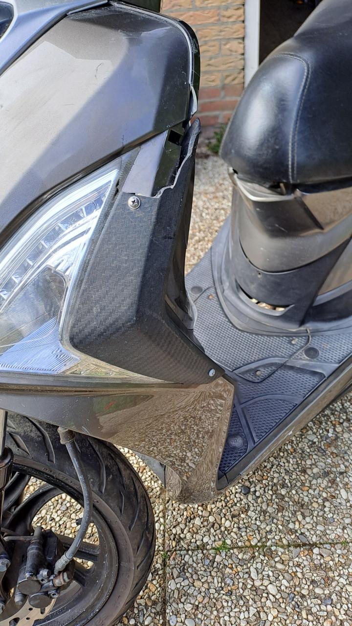 Sym Symphony ST scooter met schade.