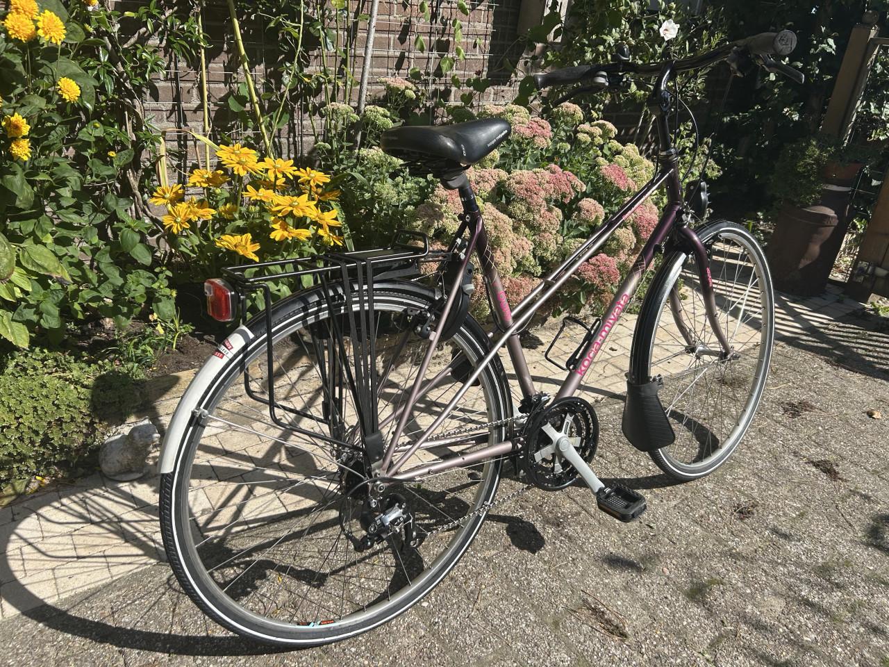 Dames fiets Koga Miyata 28 inch. 21 versn. velgrem verlichting. OK!