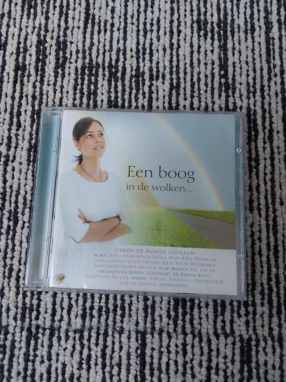CD een boog in de wolken