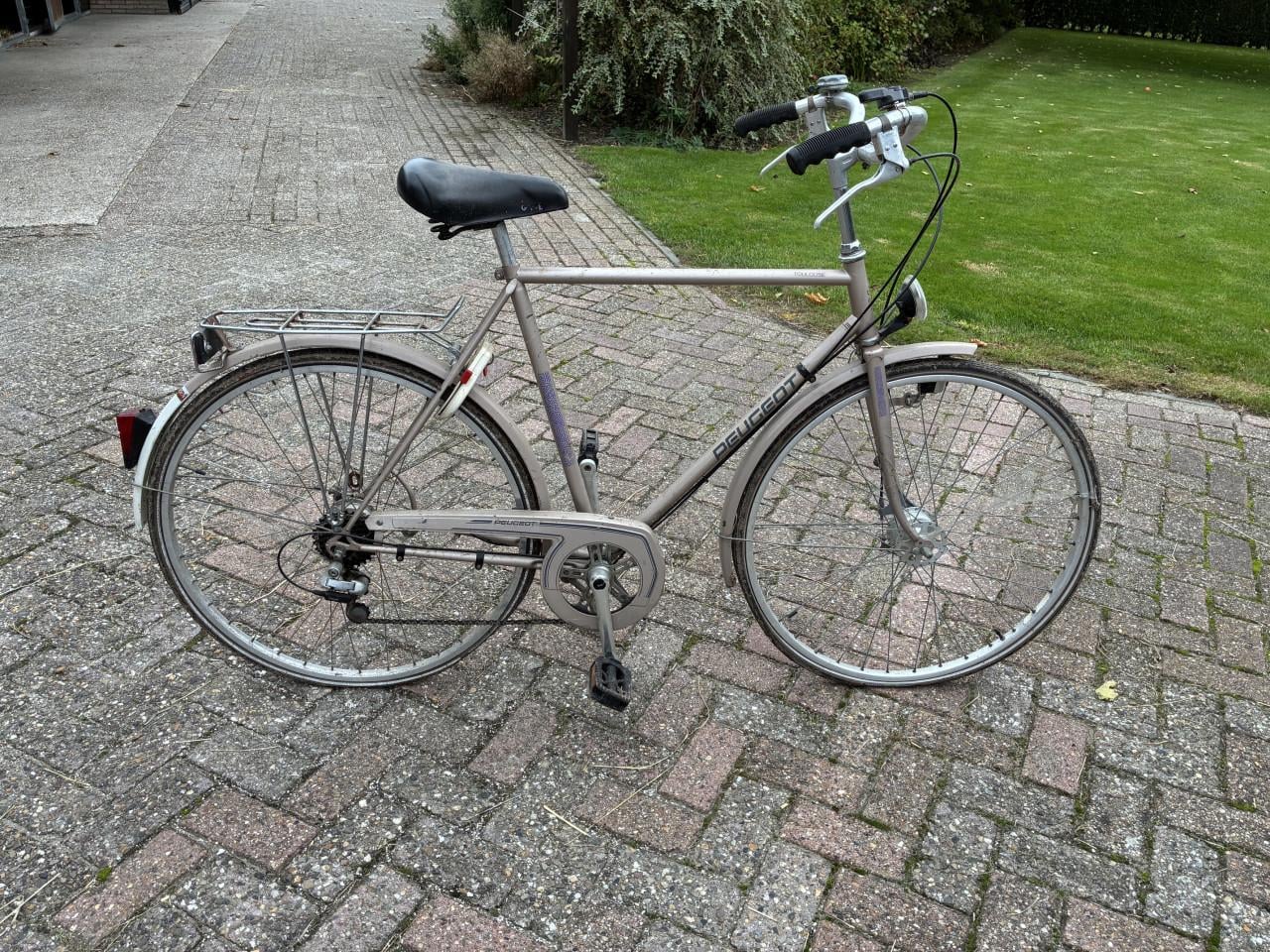 Peugeot sportfiets en Sparta damesfiets (studentenfietsen)