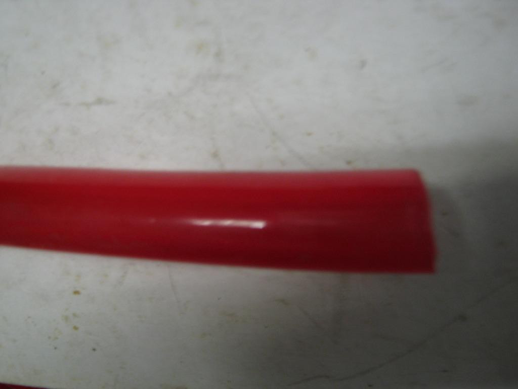 10 mtr. rode doorzichtige pvc waterslang, glad 3.2 x 4.2 cm.
