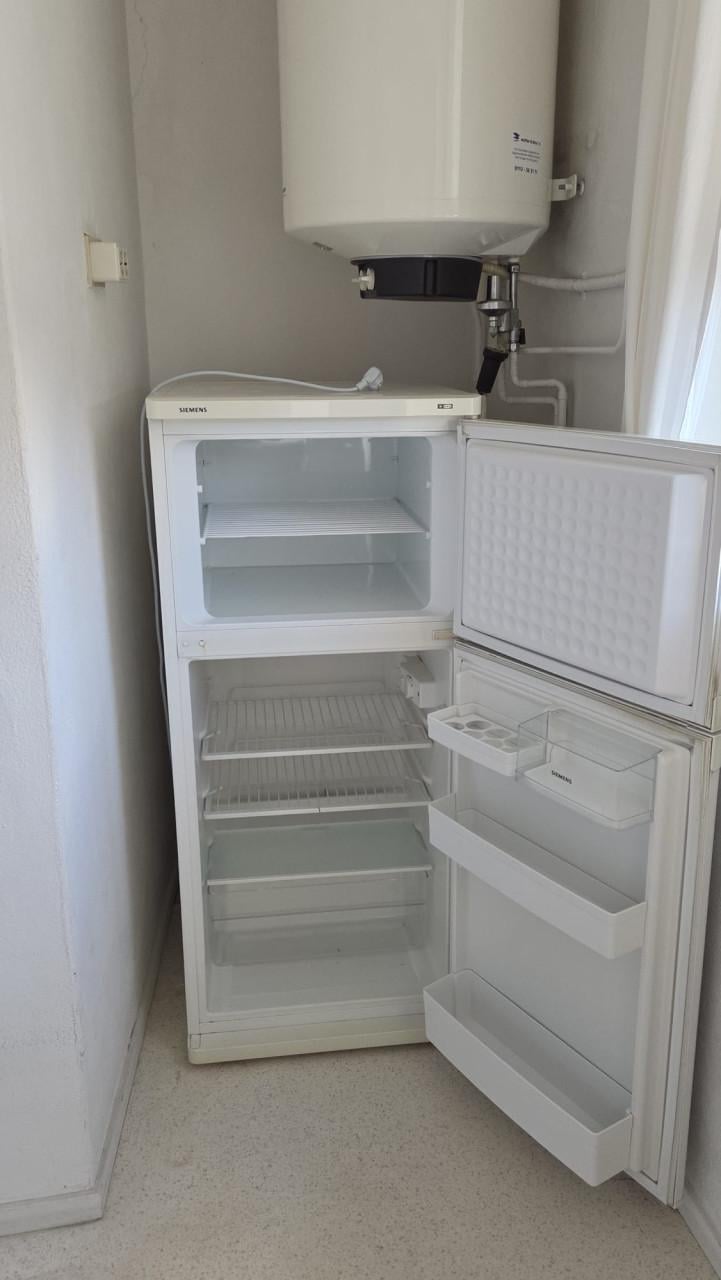 Wasmachine, koelkast, magnetron, gasfornuis