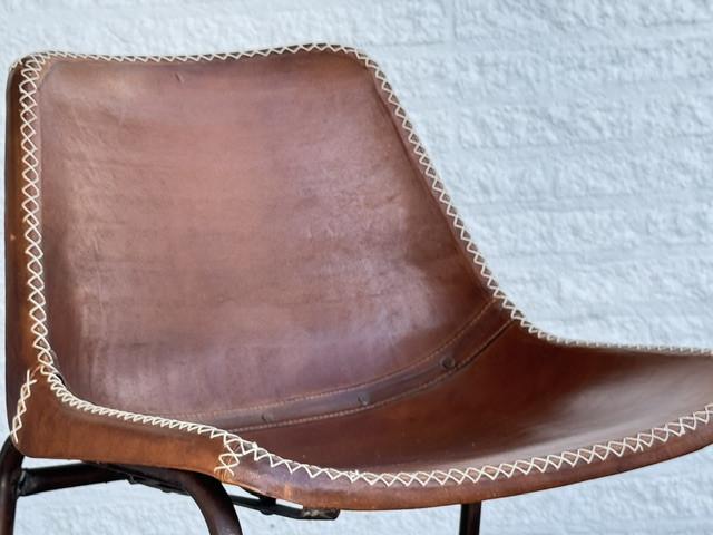 8 stuks lederen eetkamerstoelen