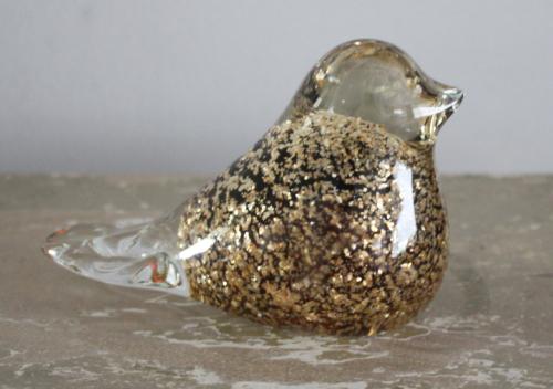 Glazen vogel met goudkleur