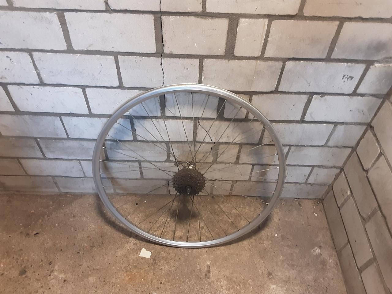 28 inch shimano achterwiel, 7 speed cassette, uitvalnaaf