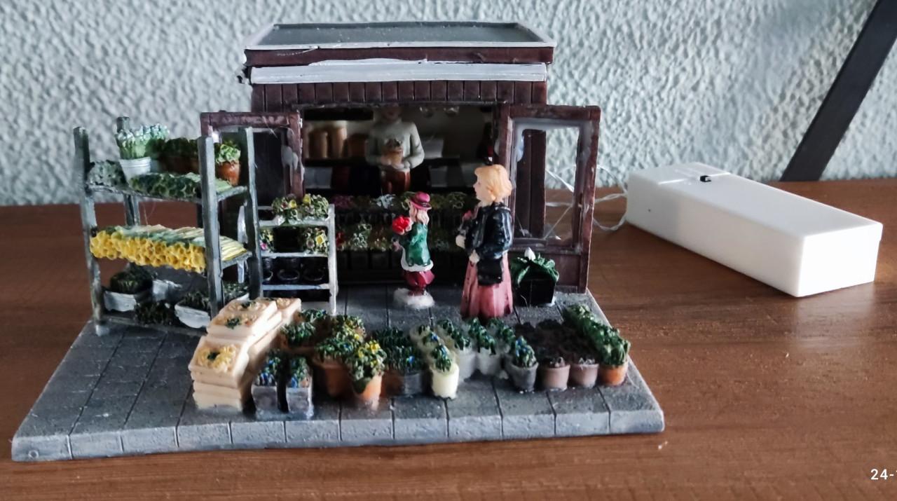 Bloemenkraam kerstdorp