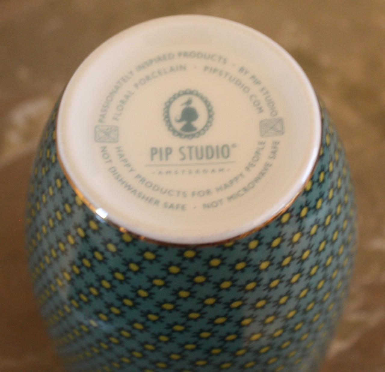 Nieuwe mok groen met gele zonnetjes