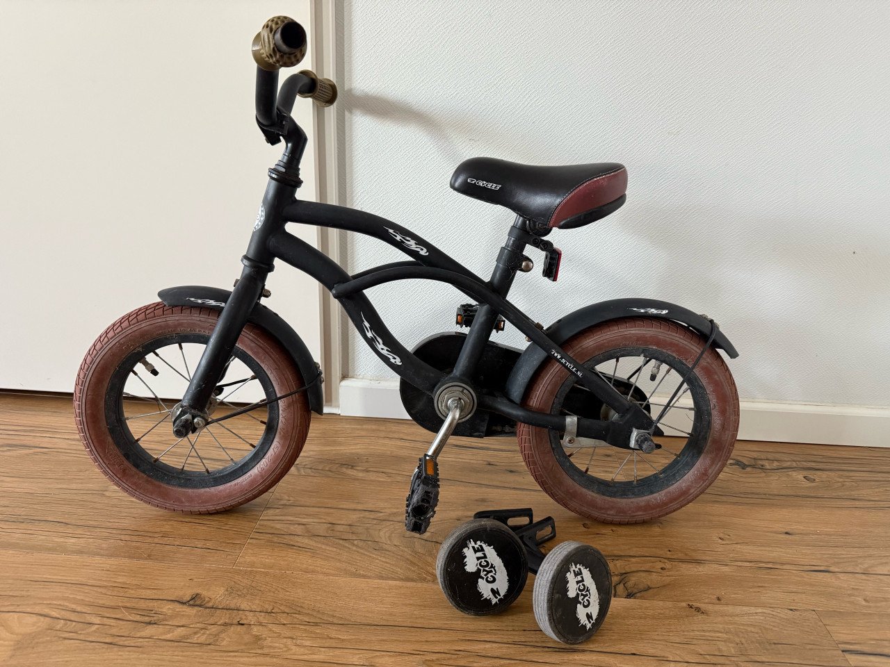 Kinderfietsje met zijwieltjes