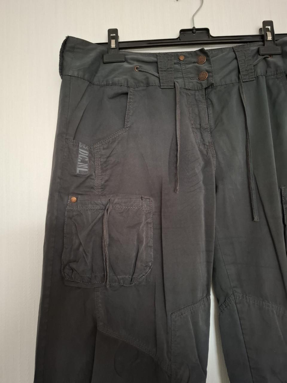 Didi broek met extra zakken en strikdetails. Grijszwart. Maat 44.