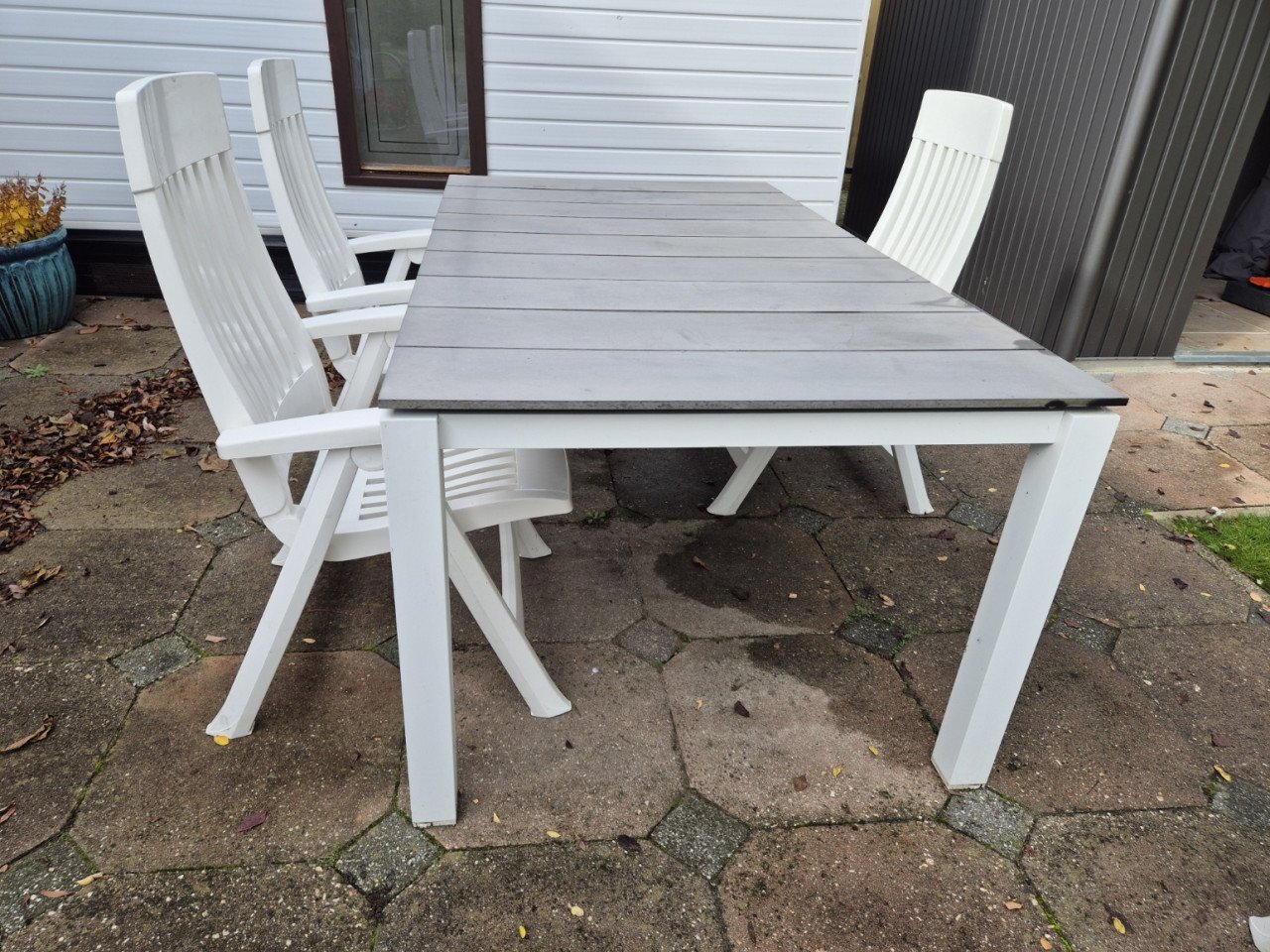 Tuintafel met 4 stoelen en kussens