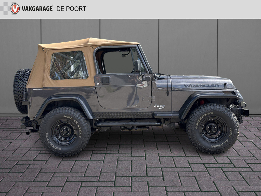 Jeep Wrangler 4.0i sport | gerestaureerd | bullbar | sidebars | trekhaak