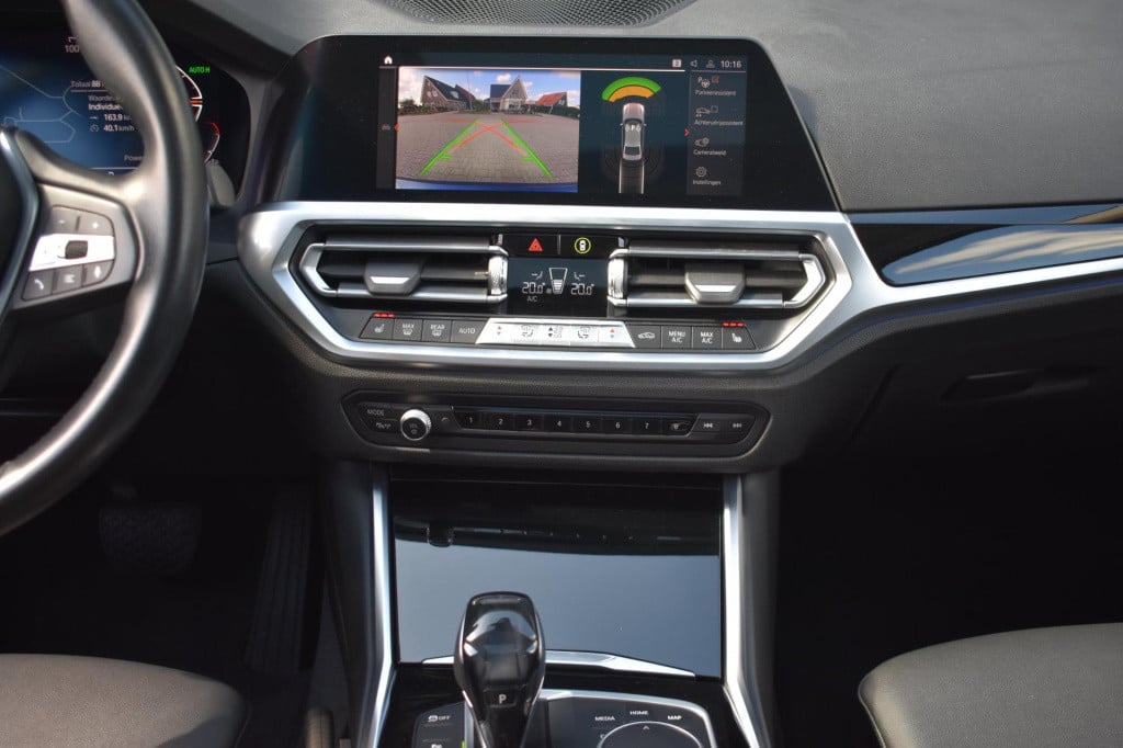 BMW 3-serie 320i high executive | harman kardon | schuif kanteldak | leder 
