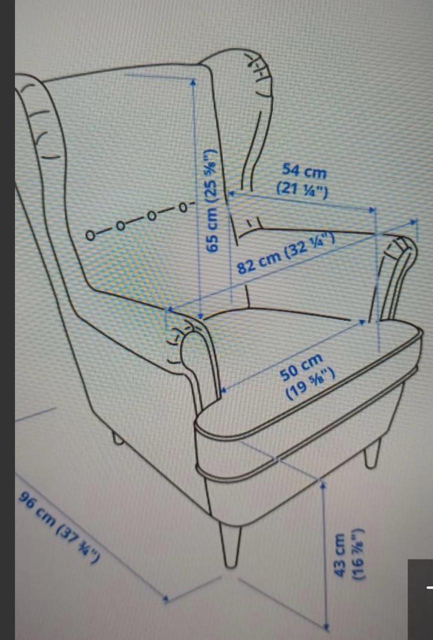 Groene oorfauteuil Strandmon Ikea met voetenbank