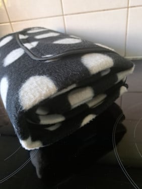 Kleed fleece kunststof zwart/wit