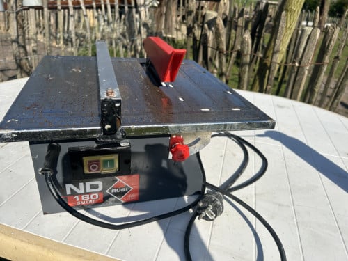 Tegelzaag RUBI ND 180, met gratis 14kg Schönox Q6 tegellijm