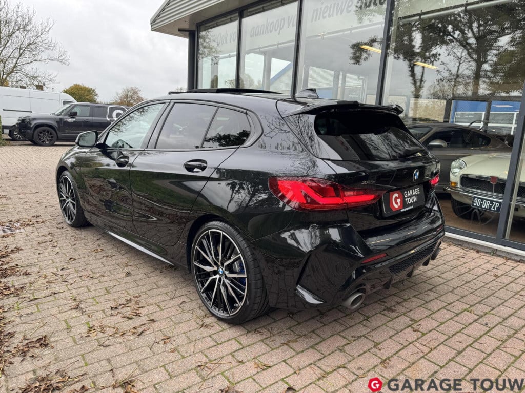 BMW 1 Serie m135i xdrive high executive edition pano orig.nl