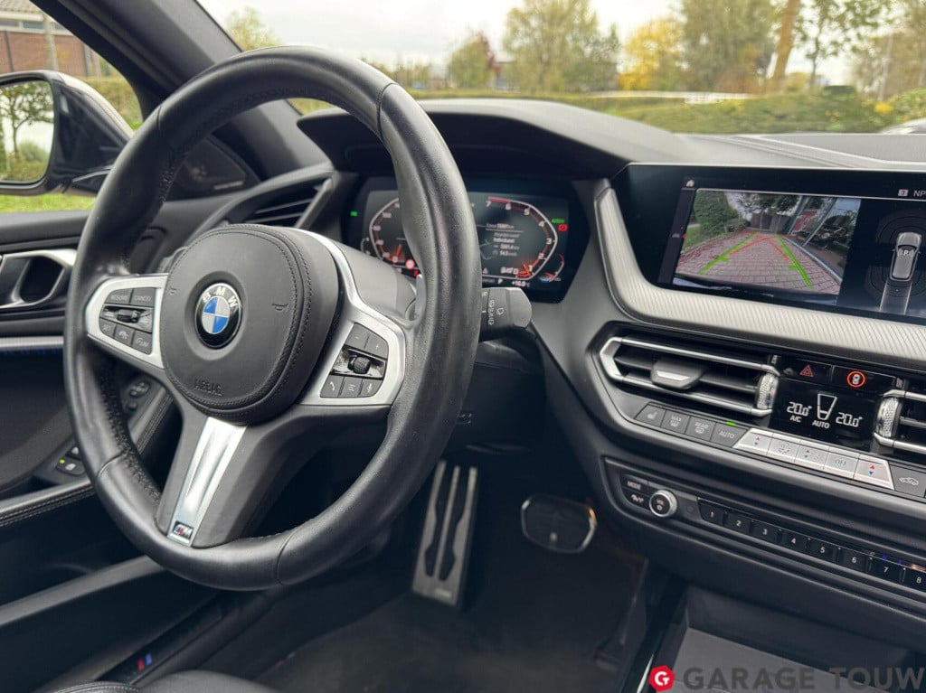 BMW 1 Serie m135i xdrive high executive edition pano orig.nl