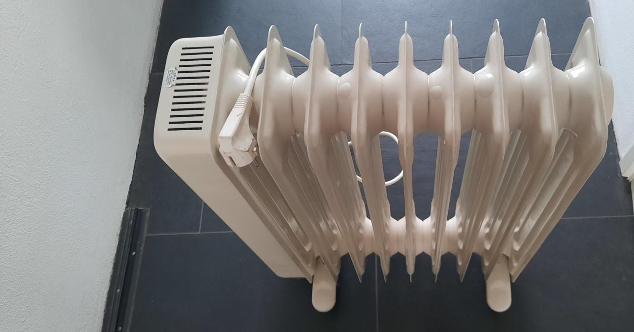 Oliegevulde radiator kachel
