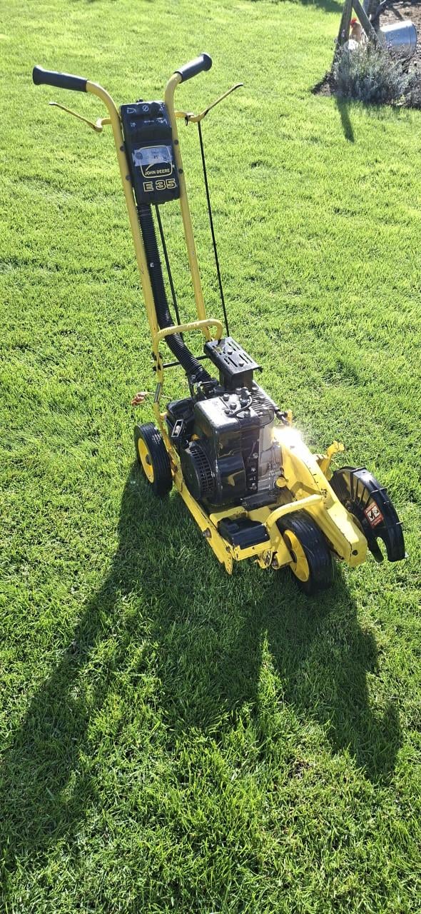 John Deere kantensnijder.