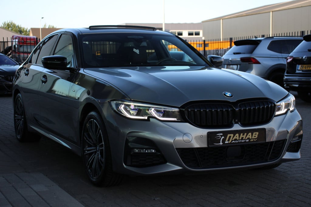 BMW 3-serie 330e high executive m-sport | schuifdak | laser | h&k | el. sto