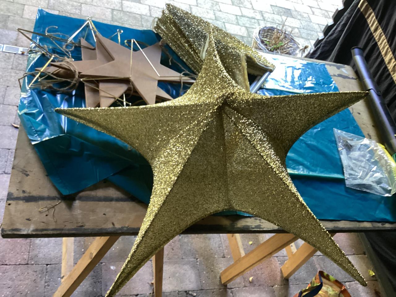 Opvouwbare goudkleurige Kerststerren