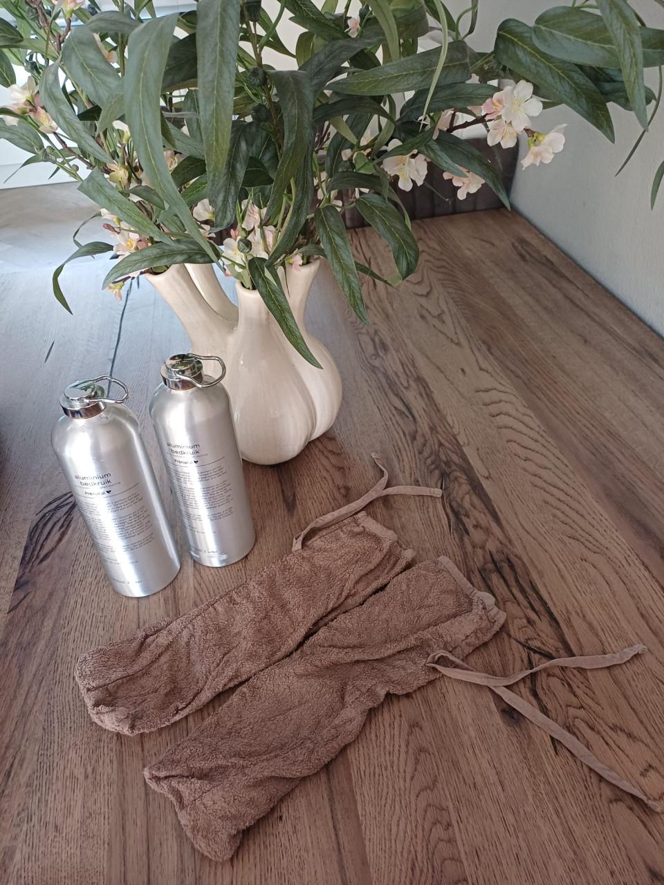 Prénatal aluminium kruik 2x + 2x Prénatal kruikenzak — €10