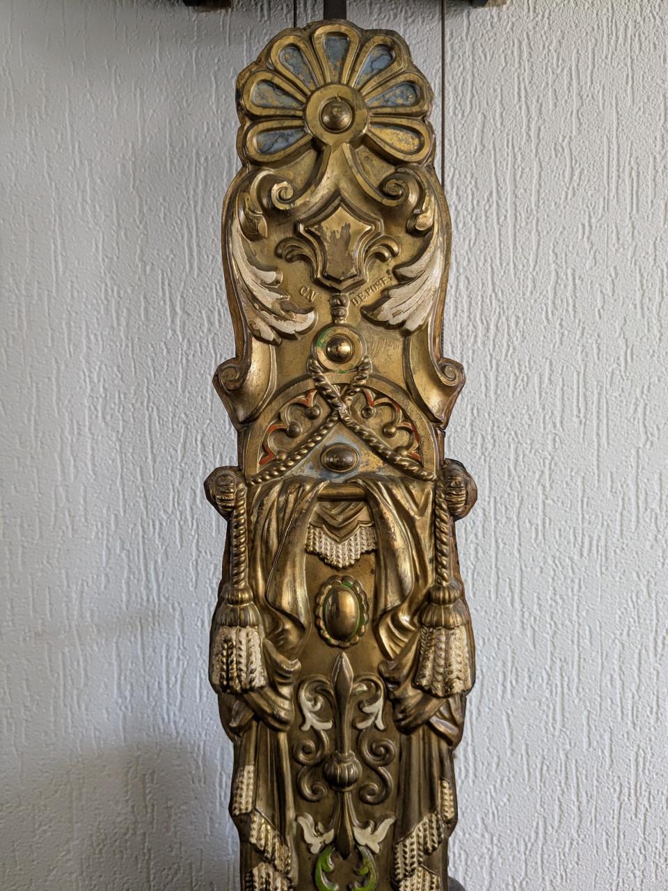 Mooie comtoise klok met bloemslinger