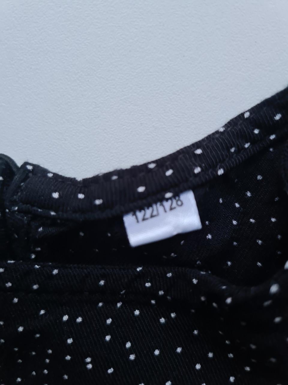 Zwart wijd vallend blousje met witte stipjes Maat 122-128