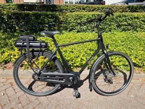 Keurig nette Cortina elektrische heren fiets met middenmotor