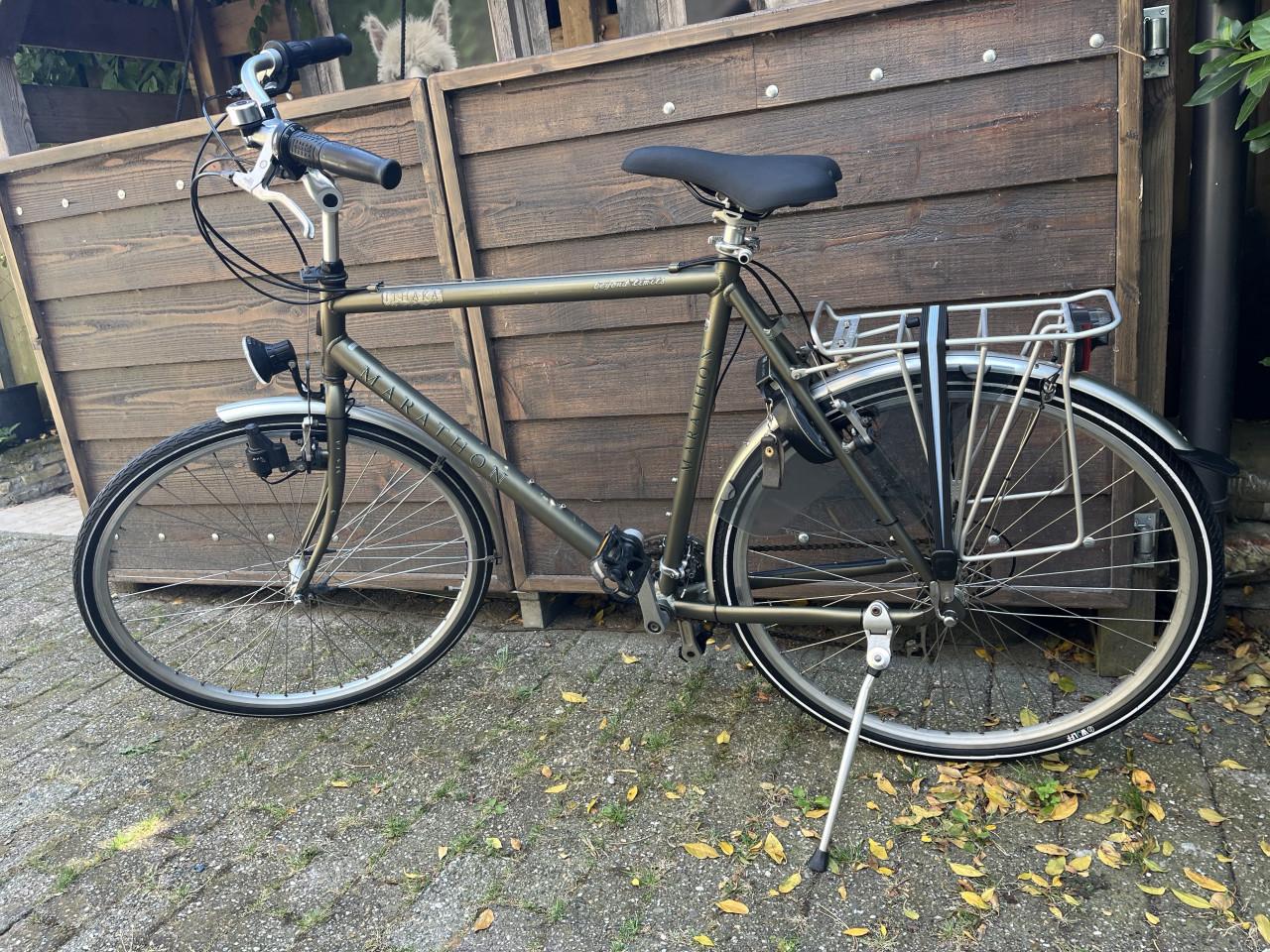Herenfiets Sportfiets Sparta Marathon 21 versn. Velgrem, verlichting.
