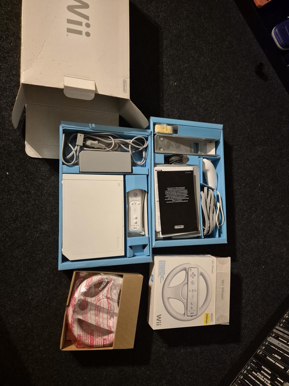 Nintendo wii compleet in doos met veel games + losse wii