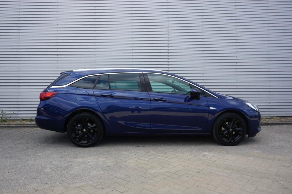 Opel Astra sports tourer 1.2 elegance airco / navi / cruise / camera / park