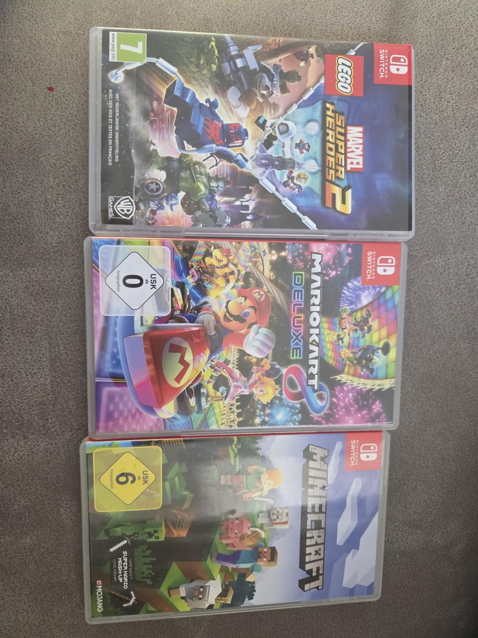 Nintendo Switch Lite grijs en geel evt. incl. spellen