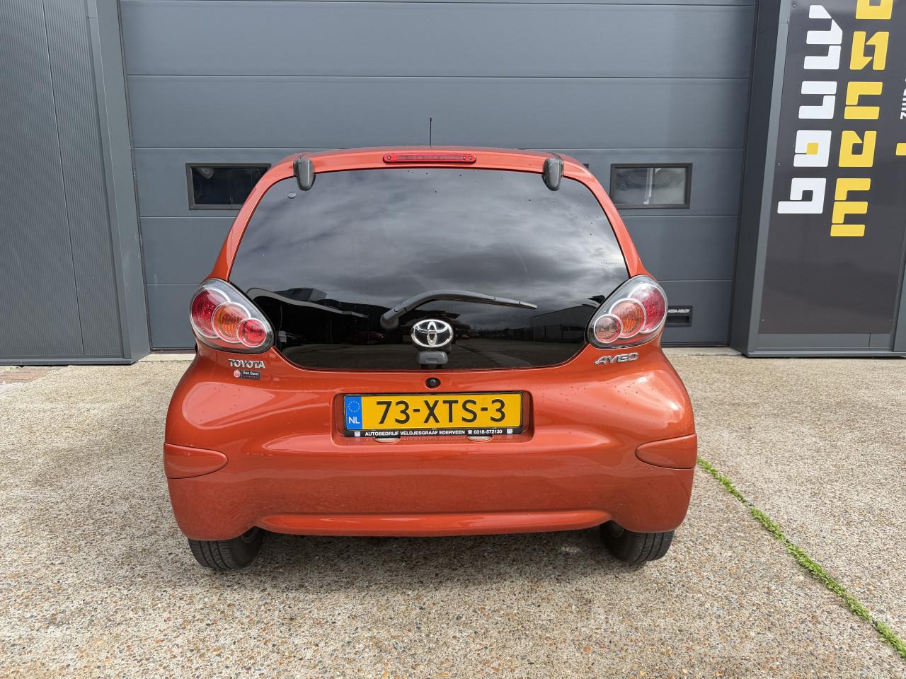 Toyota Aygo 1.0 12V Vvt-i 5DRS 2012 Dynamic Orange Airco Apk