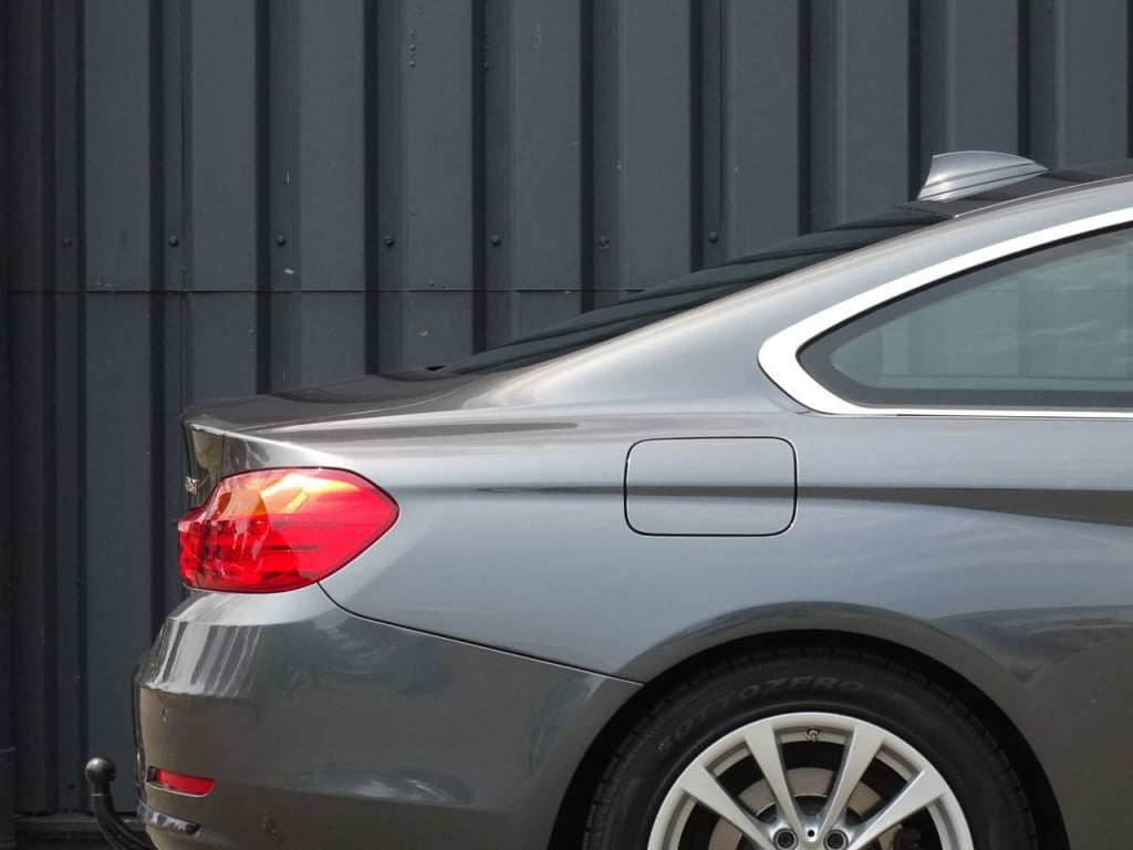 BMW 4 Serie coupé 428i high executive